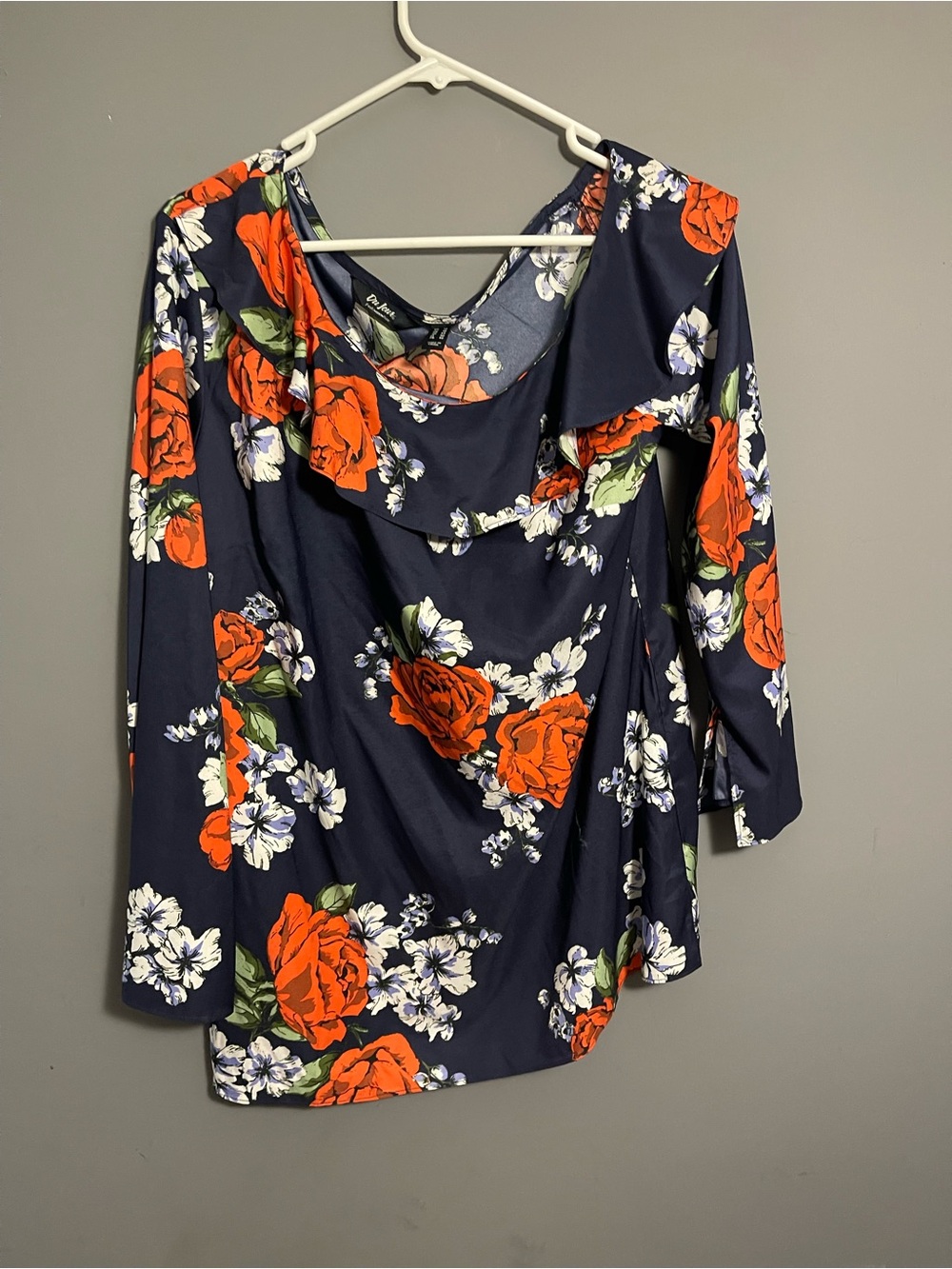 Ariella Navy Floral Blouse with Red Roses and ruffle in front
